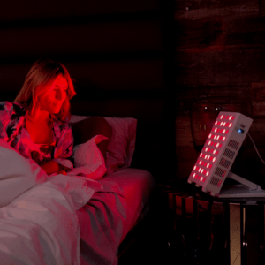 Girl falling asleep with red light therapy